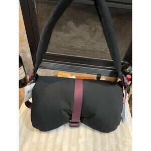 B317 - NWT Coach Coachtopia Loop Puffy Wavy Dinky bag in black and purple trim.